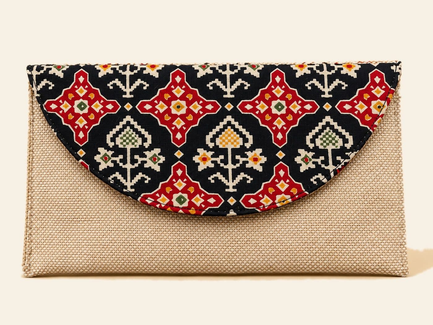Ikat Clutch — handmade jute bag by HuskWorks, available for bulk and custom-branded orders